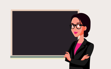 Teacher Standing in Front of a Blackboard in Class