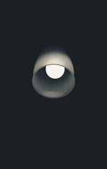 Lamp lit in a dark room at night