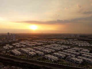 Fototapeta na wymiar aerial view of a sunset over the housing area