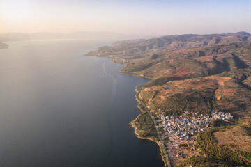 Aerial view of the Fuxian Lake coast with boats, Yunnan - China