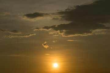 Beautiful sunset sky above clouds with dramatic light