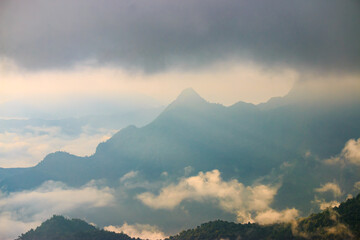 Beautiful valley in the morning sun fog