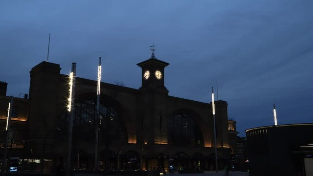 TIME LAPSE - Day to night at King's Cross Station, London, England, wide shot