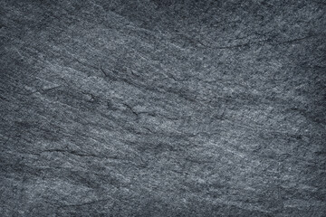 Dark stone or black slate stone texture abstract background