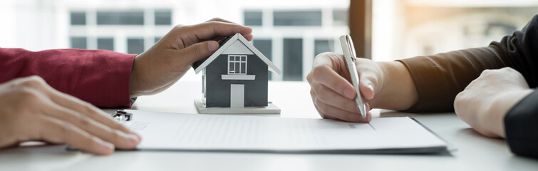 Real estate agents offer sale home insurance and close the sale immediately after the customer...