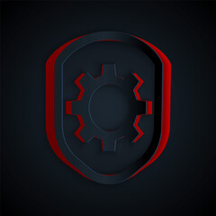 Paper cut Shield with settings gear icon isolated on black background. Adjusting, service, maintenance, repair, fixing. Paper art style. Vector Illustration