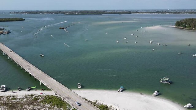 aerial timelapse of Longboat Pass and Jewfish Key in Sarasota, Florida. Well known boat party spot
