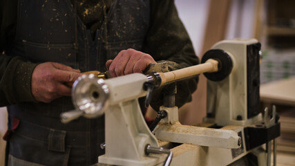 Woodwork and furniture making. Joinery, woodworking and furniture making, professional carpenter cutting wood in carpentry shop, industrial concept