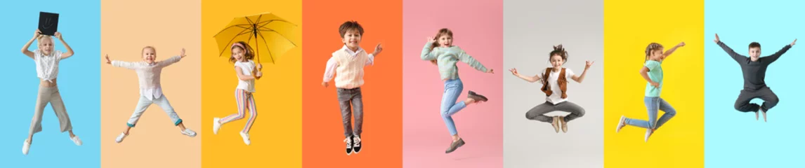 Fotobehang Jumping children on color background © Pixel-Shot