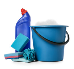 Bucket with cleaning supplies on white background