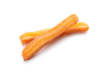 Tasty churros on white background