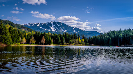 Lost Lake near the village f Whistler, with the ski slopes of Whistler Mountain in the background...