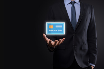 Business man in suit hand holding blank credit card icon showing for concept banking and finance service