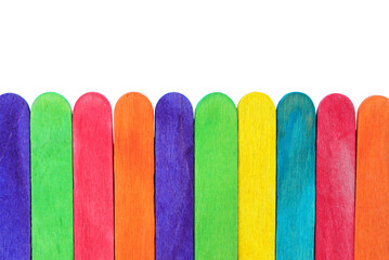 Colourful wooden popsicle sticks background. clipping path included.