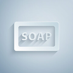 Paper cut Bar of soap icon isolated on grey background. Soap bar with bubbles. Paper art style. Vector.