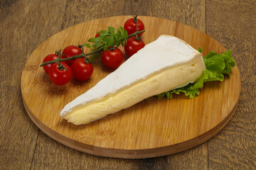 Brie cheese triangle served salad