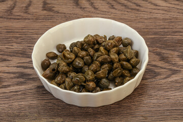 Tasty capers in the bowl