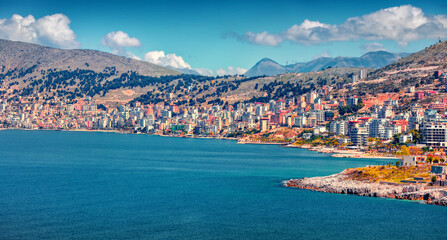 Fototapeta premium Astonishing summer cityscape of Saranda port. Magnificent Ioninian seascape. Spectacular morning scene of Albania, Europe. Traveling concept background.