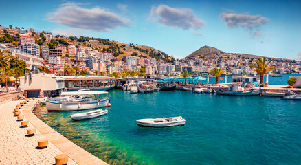 Perfect spring cityscape of Saranda port. Picturesque Ioninian seascape. Bright morning scene of...
