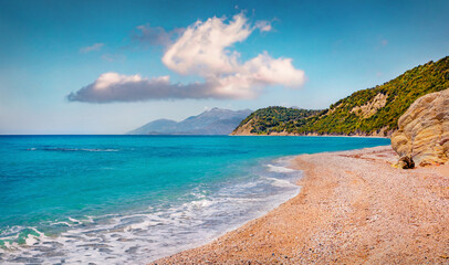 Obraz premium Sunny spring view of empty Lukove beach. Adorable seascape of Adriatic sea. Wonderfuloutdoor scene of Albania, Europe. Beauty of nature concept background.