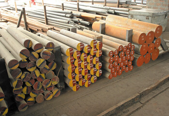 Ingots, steel bars and metal blanks with marking kept in warehouse