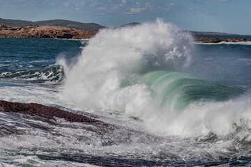 Dramatic wave action at Boat Harbour, Port Stephens, NSW, Australia