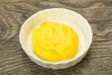 Natural cheese sauce in the bowl
