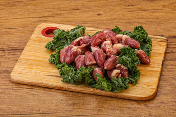 Raw chicken hearts for cooking