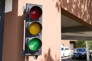Green traffic lights to manage traffic from the car exit from the garage residential entrance