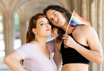 man and woman demonstrating for lgbt gay pride day