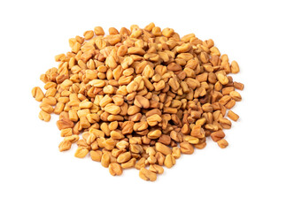 handful of Fenugreek seeds closeup on white
