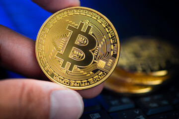 close up golden bitcoin