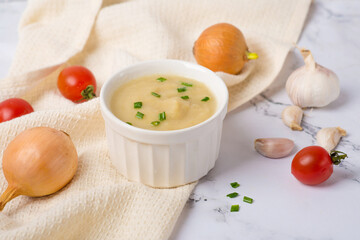 French onion soup on a white table