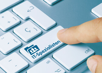 IT-Spezialisten - Wort auf blauen taste.
