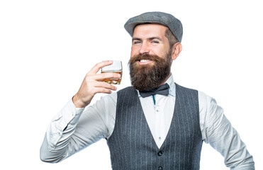 Sipping finest whiskey. Portrait of man with thick beard. Macho drinking. Stylish rich man holding a glass of old whisky. Bearded gentleman drink cognac