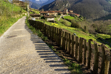 Fototapeta na wymiar BANDUJO, SPAIN - MARCH 24, 2019: View of the mediaval village of Bandujo in Asturias mountains. North of Spain.