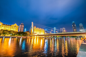 Night view of modern architecture street along Haihe River in Tianjin