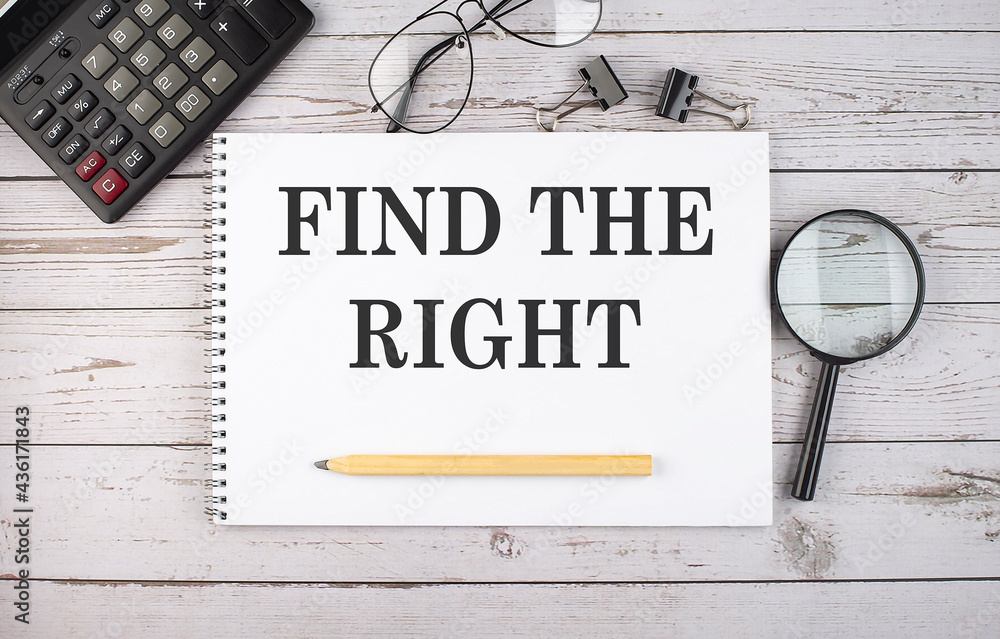 Poster blank notebook with text find the right on white background with calculator and office tools.