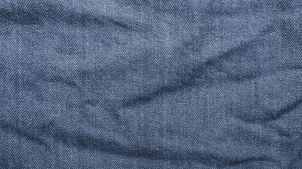 Texture of wrinkled blue jeans seamless, Detail cloth of denim for pattern and background, Close up