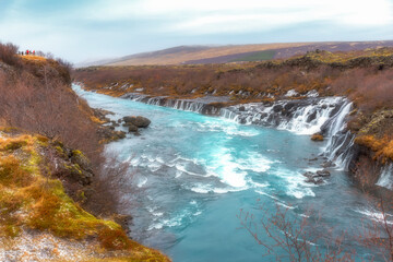 Hraunfossars waterfall or called lava waterfalls, One of the popular waterfalls for tourist visit near the village of Reykholt, Borgarbyggd in west Iceland.