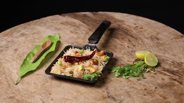Uppuma or uppittu is a popular breakfast menu from south India on wood background