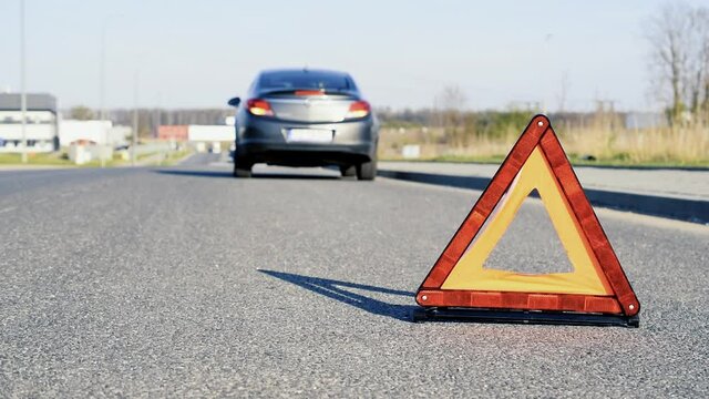Car accident triangle. Auto vehicle broken down on road. Motor car problem concept
