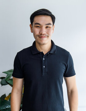 Smart Young Asian Man In Black Casual Shirt Confidently Smiling As Happy For Healthy Life In Holiday Relaxing.