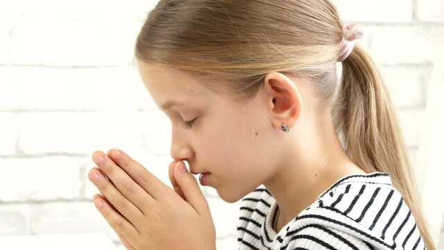 Child Praying Before Eating Breakfast in Kitchen, Kid Preparing to Eat Meal, Christian Girl Religious View at Home