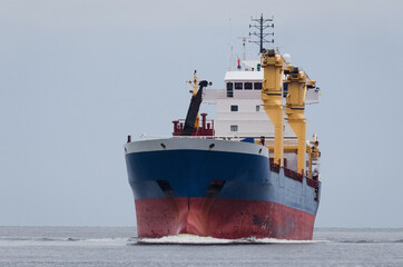 MERCHANT VESSEL - Freighter sails on the sea
