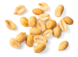close up of roasted peanuts isolated on white background, top view
