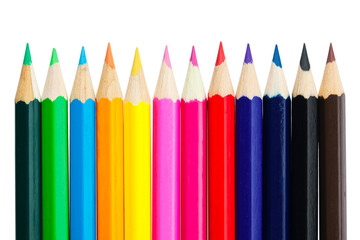 Row of color pencils isolated on white background