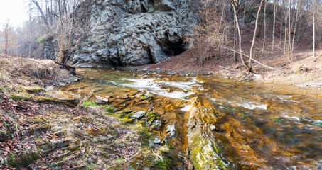 The Czarny Potok stream flowing next to the cave in Rosolina, Polana, Bieszczady Mountains © LukaszB