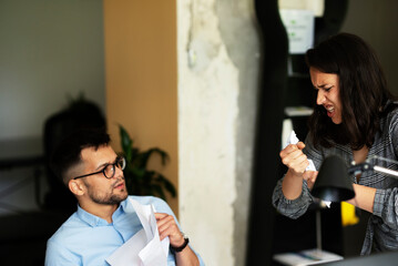Colleagues arguing in office. Problem in team.