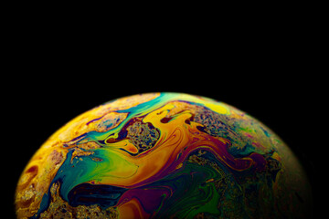 Planet night. Abstract galaxy background with globe earth in universe space with sunlight on dark background. Fantastic structure of colorful bubbles.